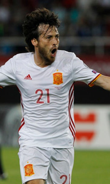 Silva, Costa keep Spain in lead of WCup qualifying group